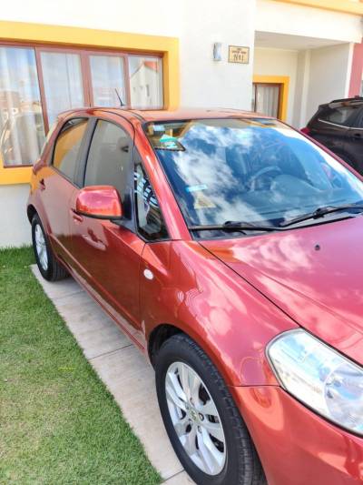 Hermosa Vagoneta Suzuki SX4, 10/10 Foto
