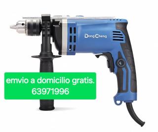 taladro dong cheng mediana industrial de impacto. Foto